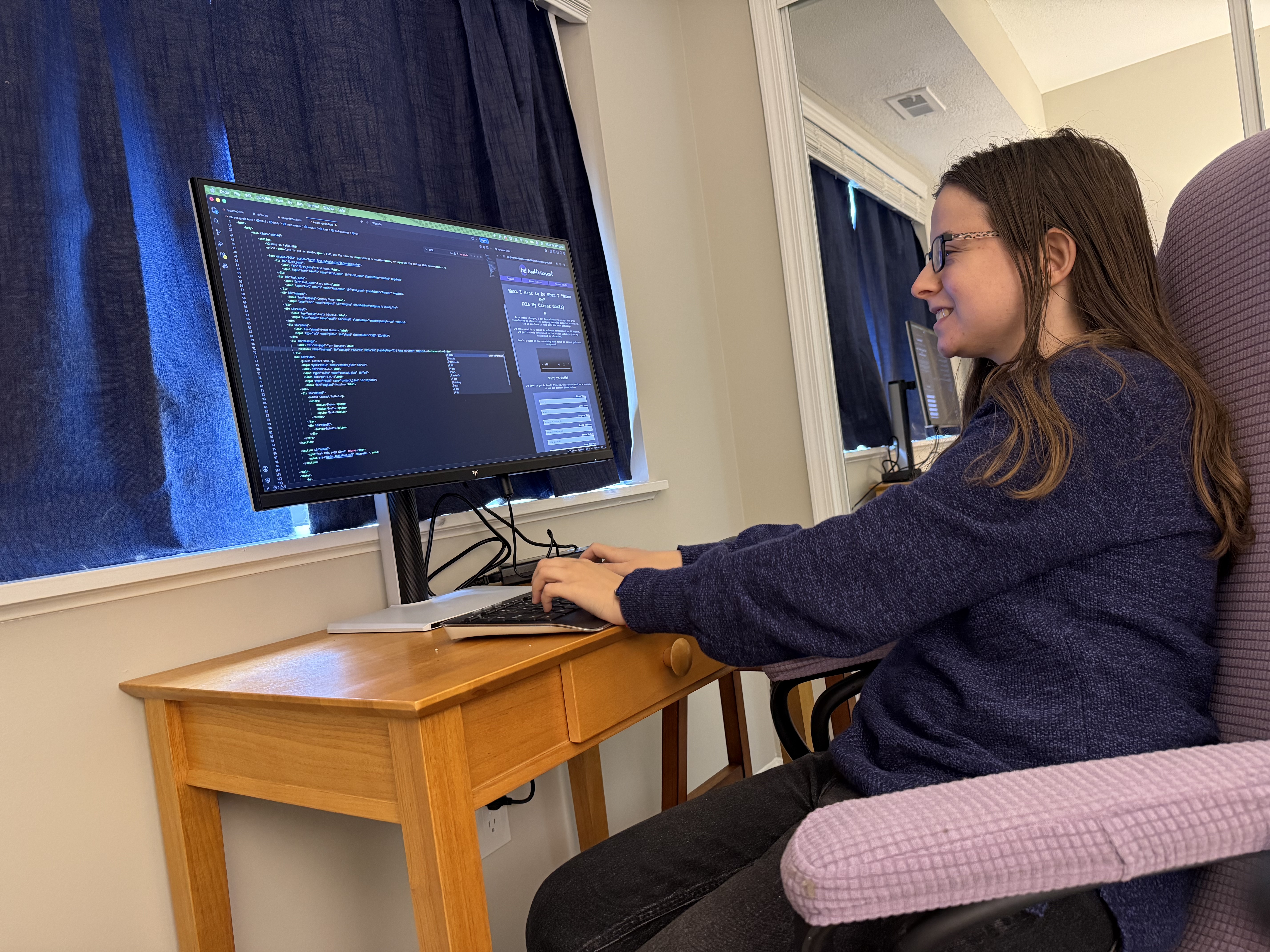 Maddie Norwood working at a computer