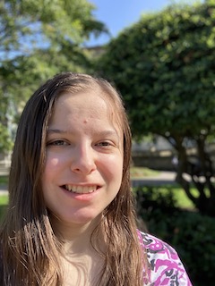 A picture of myself outside on a sunny day.